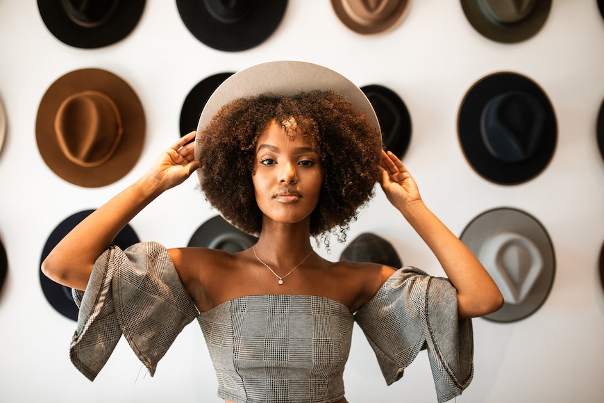 Model wearing hat